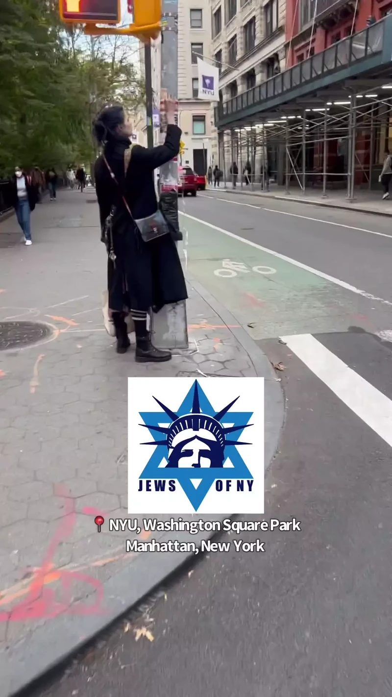 Nikki Stone Rips Down Posters of Israeli Civilians Kidnapped by Hamas Instagram New York City_#7